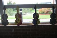 Some fiddles didn't make it to the stage... These were donated for use by the Duluth Arts Council.  Special thanks to Wallace Reid photography