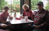 Chris Alex, and Cheryll Thomlinson eating at Chik-fil-A